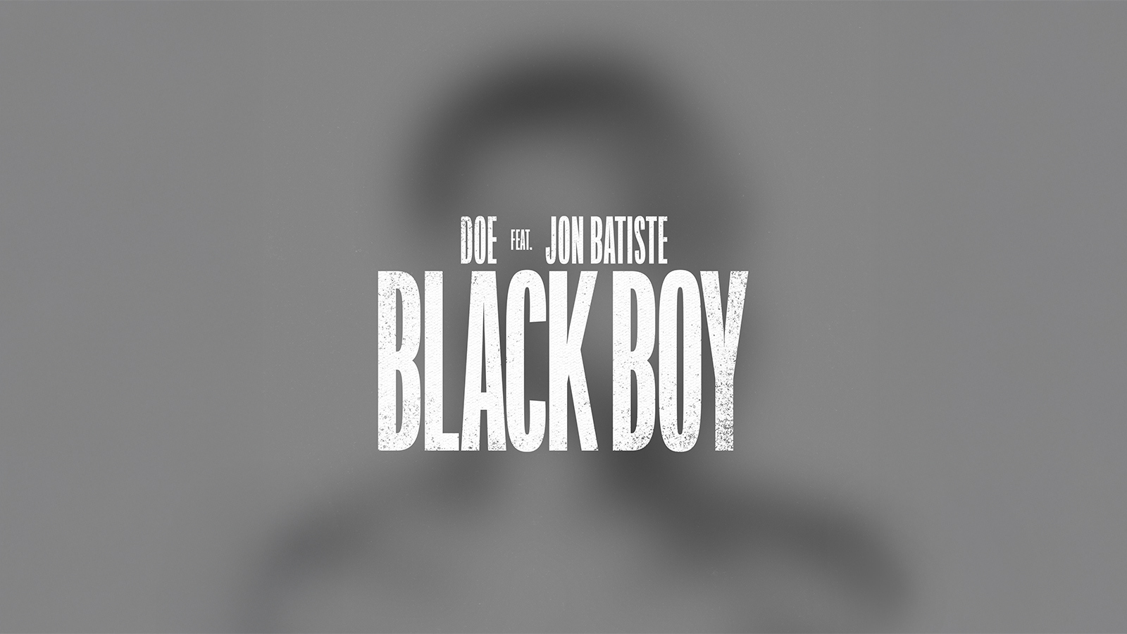 A blurred outline of a young man on a gray background with the words DOE feat. Jon Batiste Black Boy overlaid in white text.