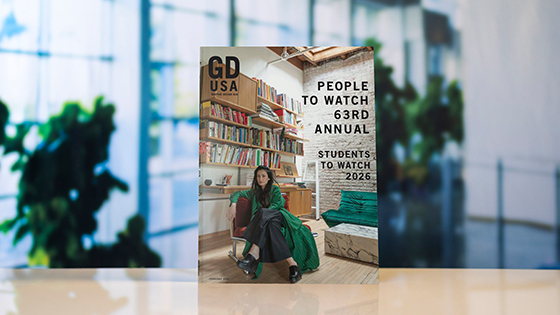 The cover of ‘Graphic Design USA’ featuring a designer sitting in a loft and the words People to Watch 63rd Annual and Students to Watch 2026.