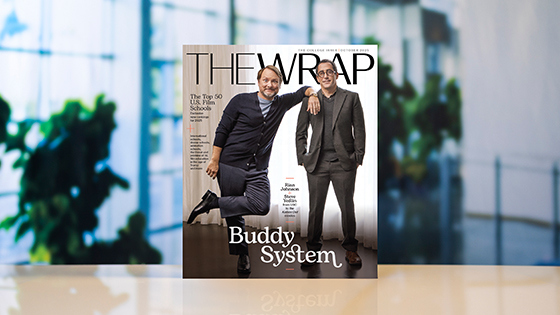 Two men wearing suits stand next to each other on the October 2025 cover of TheWrap magazine. The headline “Top 50 US Film Schools” is next to them.
