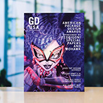 The April 2025 issue of Graphic Design USA. The cover features a cartoon woman with purple hair wearing red glasses and article titles including 2025 Top Design Schools.